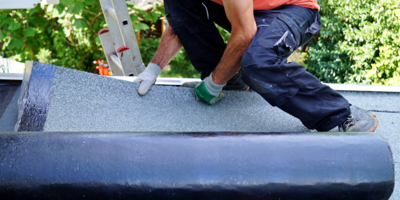 commercial roofing maintenance in the hands of a professional roofing contractor
